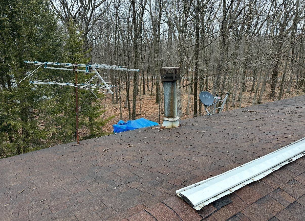 Storm Damage Roof Repair - Photo 11